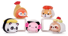 A collection of plush toys designed to look like various animals in sushi costumes. The visible plushies include one that resembles a panda in a tamago sushi costume, a pink one that looks like a salmon in a maki sushi, and others with different animal and sushi designs.